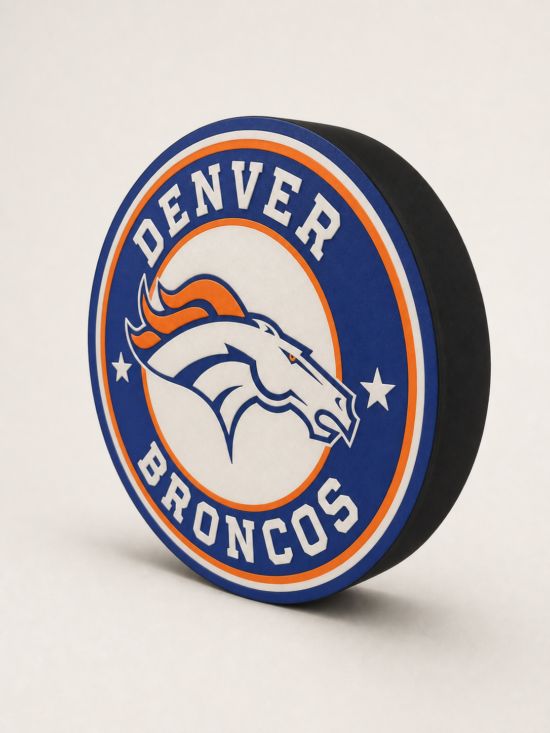 Custom blue and orange round LED lightbox, unlit, shown at a three-quarter angle on a bright warm neutral studio background
