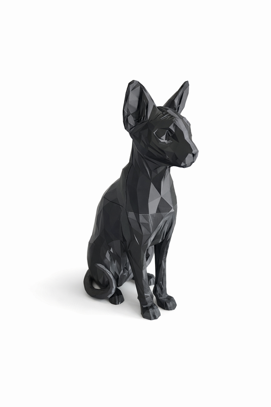 Black geometric dog sculpture on a white background