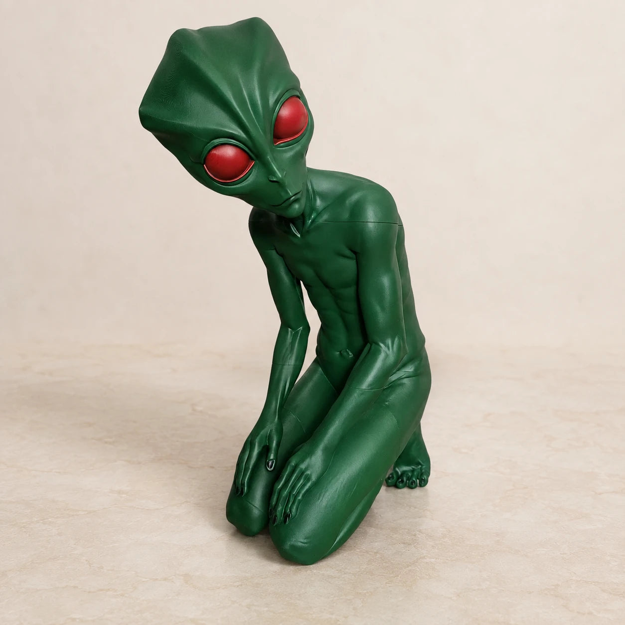 A large green character sculpture made by GM3DPrint